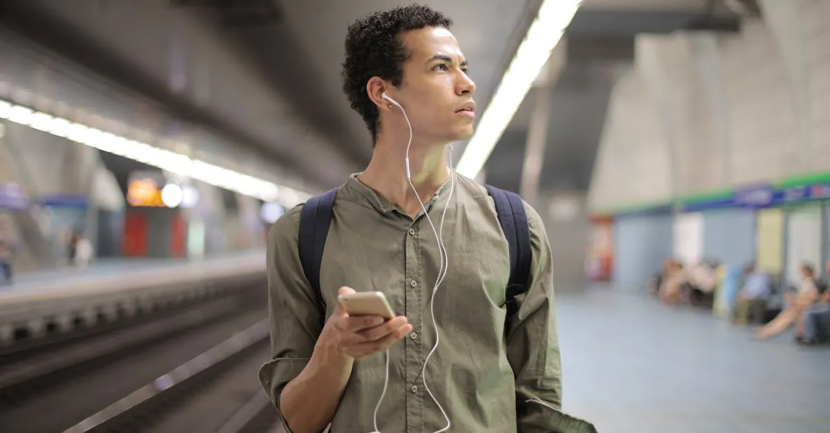 Person listening to audio on smartphone with headphones