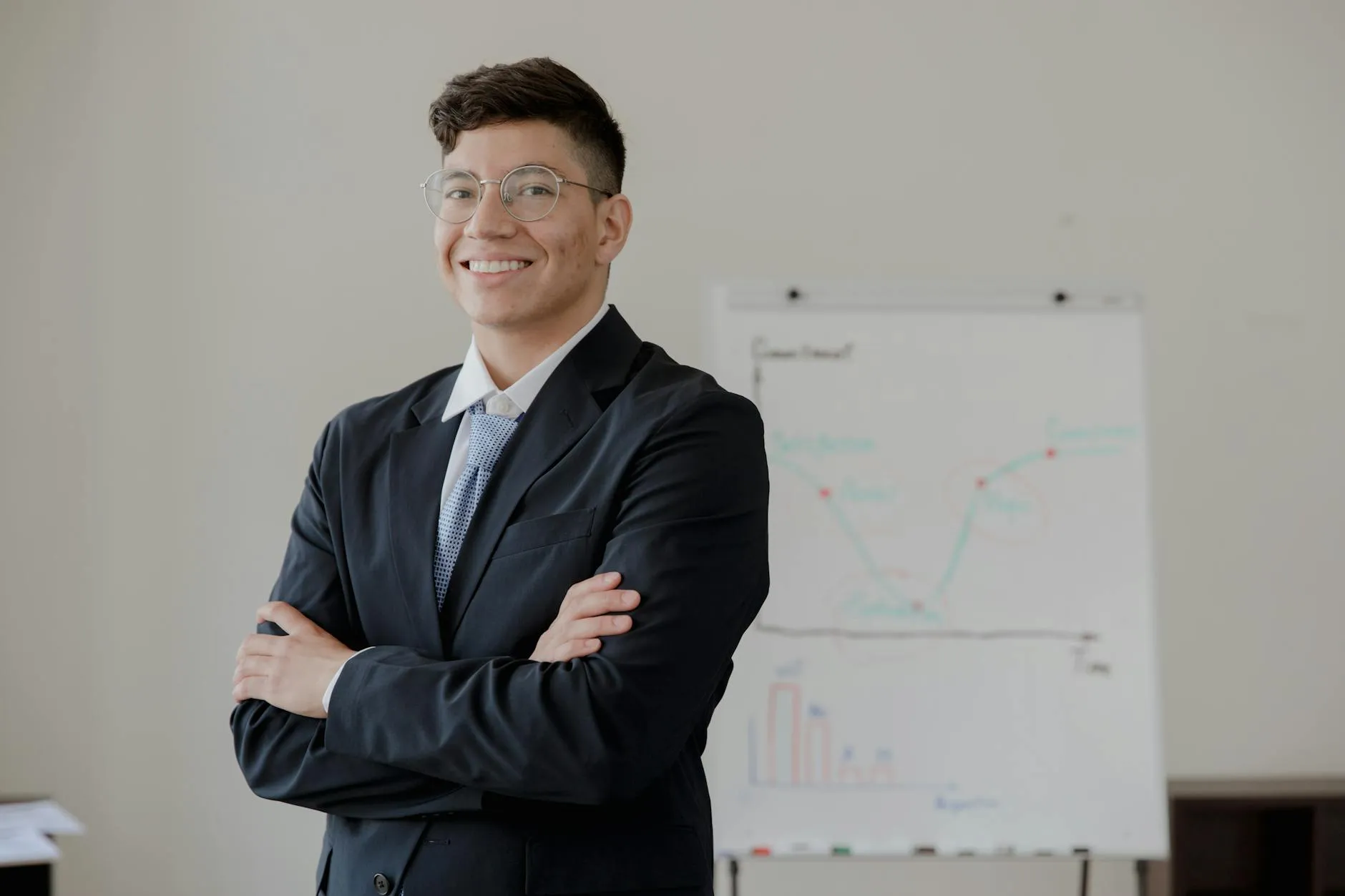 Speaker presenting with confidence at a desk